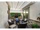 Cozy covered patio with outdoor seating, fountain, and lush greenery at 20528 W Coolidge St, Buckeye, AZ 85396