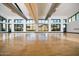 Bright studio featuring wood floors, high ceilings, and large windows at 20528 W Coolidge St, Buckeye, AZ 85396