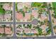 Aerial view of a residential neighborhood showcasing homes with sparkling pools and well-manicured landscaping at 2068 S Sailors Ct, Gilbert, AZ 85295