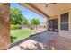 Covered back patio overlooking fenced yard at 2068 S Sailors Ct, Gilbert, AZ 85295