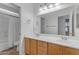 Bathroom featuring dual sinks, tile floors, and shower-tub combination at 2068 S Sailors Ct, Gilbert, AZ 85295