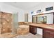 Bathroom featuring a shower, tub, granite countertops, tile floors and window shutters at 2068 S Sailors Ct, Gilbert, AZ 85295
