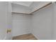 Walk-in closet featuring built in shelving with closet rod at 2068 S Sailors Ct, Gilbert, AZ 85295