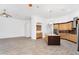 A spacious kitchen with wooden cabinets, an island and stainless steel appliances at 2068 S Sailors Ct, Gilbert, AZ 85295