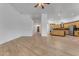 Bright, open kitchen and living space with tile floors, wooden cabinets and neutral wall paint at 2068 S Sailors Ct, Gilbert, AZ 85295