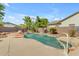Backyard pool with spa and mature landscaping offers a relaxing outdoor experience at 2068 S Sailors Ct, Gilbert, AZ 85295