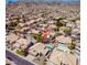 Expansive aerial view of desert neighborhood featuring tile roofs, mature landscaping, and sparkling private pools in backyard retreats at 2108 E Tecoma Rd, Phoenix, AZ 85048