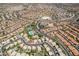 Expansive aerial view of a vibrant community with well-maintained homes and lush landscaping at 2108 E Tecoma Rd, Phoenix, AZ 85048