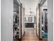 Ensuite bath with sliding barn doors and direct access to closets at 2108 E Tecoma Rd, Phoenix, AZ 85048