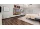 Bedroom featuring wood floors, designer accents, and lots of natural light at 2108 E Tecoma Rd, Phoenix, AZ 85048
