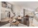 Open-concept living room and dining area with elegant finishes and plenty of natural light at 2108 E Tecoma Rd, Phoenix, AZ 85048