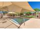 Inviting shaded wading pool providing a relaxing retreat and recreational space at 2108 E Tecoma Rd, Phoenix, AZ 85048