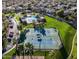 Community tennis courts surrounded by lush landscaping and well-maintained walking paths at 2108 E Tecoma Rd, Phoenix, AZ 85048