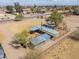 Aerial view features horse property with sheltered stalls and a fenced-in area in a neighborhood setting at 2151 S Calle Del Marcos --, Casa Grande, AZ 85194