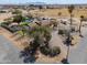 Aerial view of home with private pool, mature trees and desert landscaping at 2151 S Calle Del Marcos --, Casa Grande, AZ 85194