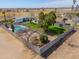 Home features a large inground pool with patio area and privacy fence for backyard enjoyment at 2151 S Calle Del Marcos --, Casa Grande, AZ 85194