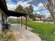 Spacious backyard featuring a covered patio, well-maintained lawn, and ample space for outdoor activities at 2151 S Calle Del Marcos --, Casa Grande, AZ 85194