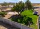 Spacious backyard features lush lawn, mature tree and privacy fence at 2151 S Calle Del Marcos --, Casa Grande, AZ 85194