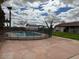 View of backyard featuring a fenced pool, a detached garage, and the back of the house at 2151 S Calle Del Marcos --, Casa Grande, AZ 85194