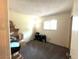 Storage room with neutral carpet, bright light, and storage boxes at 2151 S Calle Del Marcos --, Casa Grande, AZ 85194
