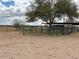 View of the green metal corral in the rear of this expansive desert property at 2151 S Calle Del Marcos --, Casa Grande, AZ 85194