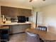 Charming eat-in kitchen with laminate countertops and views of dining room at 2151 S Calle Del Marcos --, Casa Grande, AZ 85194