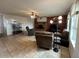 Bright living room showcasing tile flooring, cozy seating, and a charming fireplace, perfect for relaxation and entertainment at 2151 S Calle Del Marcos --, Casa Grande, AZ 85194