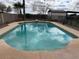 A view of a backyard pool with a diving board and crystal clear blue water on a sunny day at 2151 S Calle Del Marcos --, Casa Grande, AZ 85194
