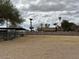 Back of property showcasing large corral area with shade and ample land at 2151 S Calle Del Marcos --, Casa Grande, AZ 85194