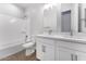 Well-appointed bathroom with double sinks, tub, shower, and modern fixtures at 21539 S 191St Pl, Queen Creek, AZ 85140