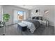 Comfortable bedroom with large window and ample natural light, perfect for relaxation at 21539 S 191St Pl, Queen Creek, AZ 85140