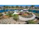 Aerial view of a community park with a playground, picnic area and scenic water views at 21539 S 191St Pl, Queen Creek, AZ 85140
