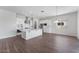 Bright kitchen featuring white cabinets, stainless appliances, and tiled backsplash at 21539 S 191St Pl, Queen Creek, AZ 85140