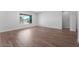 A bright open living space with durable tile floors and a large window offers seamless indoor-outdoor living at 21539 S 191St Pl, Queen Creek, AZ 85140