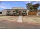 Charming single-story home with a quaint entrance and mature landscaping at 2155 W Farmdale Ave # 24, Mesa, AZ 85202