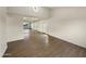 Bright living room with wood floors, paneled walls and a stained glass window at 2155 W Farmdale Ave # 24, Mesa, AZ 85202
