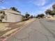 Community street view highlighting the well-maintained landscaping and building exterior at 2155 W Farmdale Ave # 24, Mesa, AZ 85202