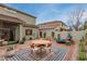 Spacious backyard featuring patio seating and lounge chair, perfect for outdoor entertaining at 21860 N 41St St, Phoenix, AZ 85050