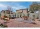 Spacious backyard with outdoor seating, lounge chair, patio and rock landscaping at 21860 N 41St St, Phoenix, AZ 85050