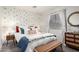 Bedroom with decorative wallpaper, neutral furniture, a queen bed and curtains, and window for natural light at 21860 N 41St St, Phoenix, AZ 85050