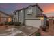 Charming two-story home with a two-car garage, desert landscaping, and a beautiful sunrise at 21860 N 41St St, Phoenix, AZ 85050