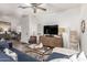 Bright living room featuring modern decor, light wood flooring and contemporary furniture at 21860 N 41St St, Phoenix, AZ 85050