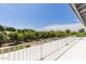 Relaxing views from the balcony featuring mature fruit trees and lush greenery, providing a tranquil setting at 2251 N 32Nd St # 31, Mesa, AZ 85213