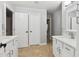 Spacious bathroom with double sink vanity, quartz counters, and tile floor at 2251 N 32Nd St # 31, Mesa, AZ 85213