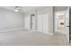 This is a spacious bedroom featuring neutral carpeting, trim, and multiple closets at 2251 N 32Nd St # 31, Mesa, AZ 85213