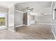Large bonus room with light wood flooring, access to a balcony, and recessed lighting at 2251 N 32Nd St # 31, Mesa, AZ 85213
