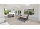 Comfortable covered patio featuring skylights, ample seating, and seamless transition to the outdoors at 2251 N 32Nd St # 31, Mesa, AZ 85213