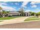 Charming single-story home with a well-maintained lawn, inviting front entrance, and ample curb appeal at 2251 N 32Nd St # 31, Mesa, AZ 85213