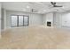 Expansive living room featuring recessed lighting, ceiling fans, and a cozy fireplace at 2251 N 32Nd St # 31, Mesa, AZ 85213