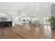 Bright, expansive living room with hardwood floors, fireplace, and high ceilings at 2251 N 32Nd St # 31, Mesa, AZ 85213